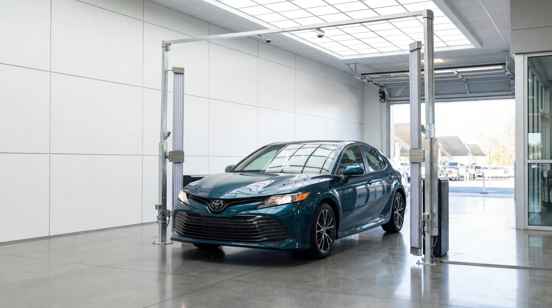Service advisor inspecting vehicles on a dealership lot